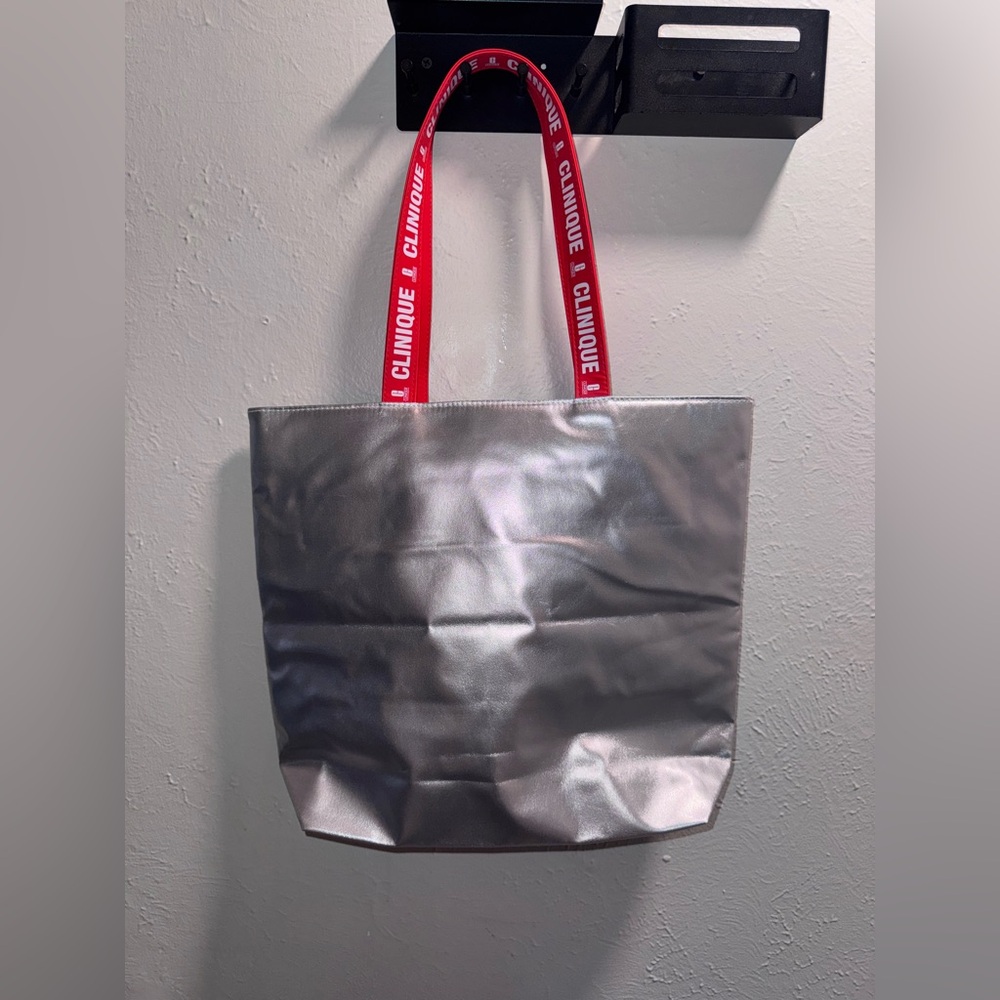 Clinique Silver Red Reflective Tote Bag